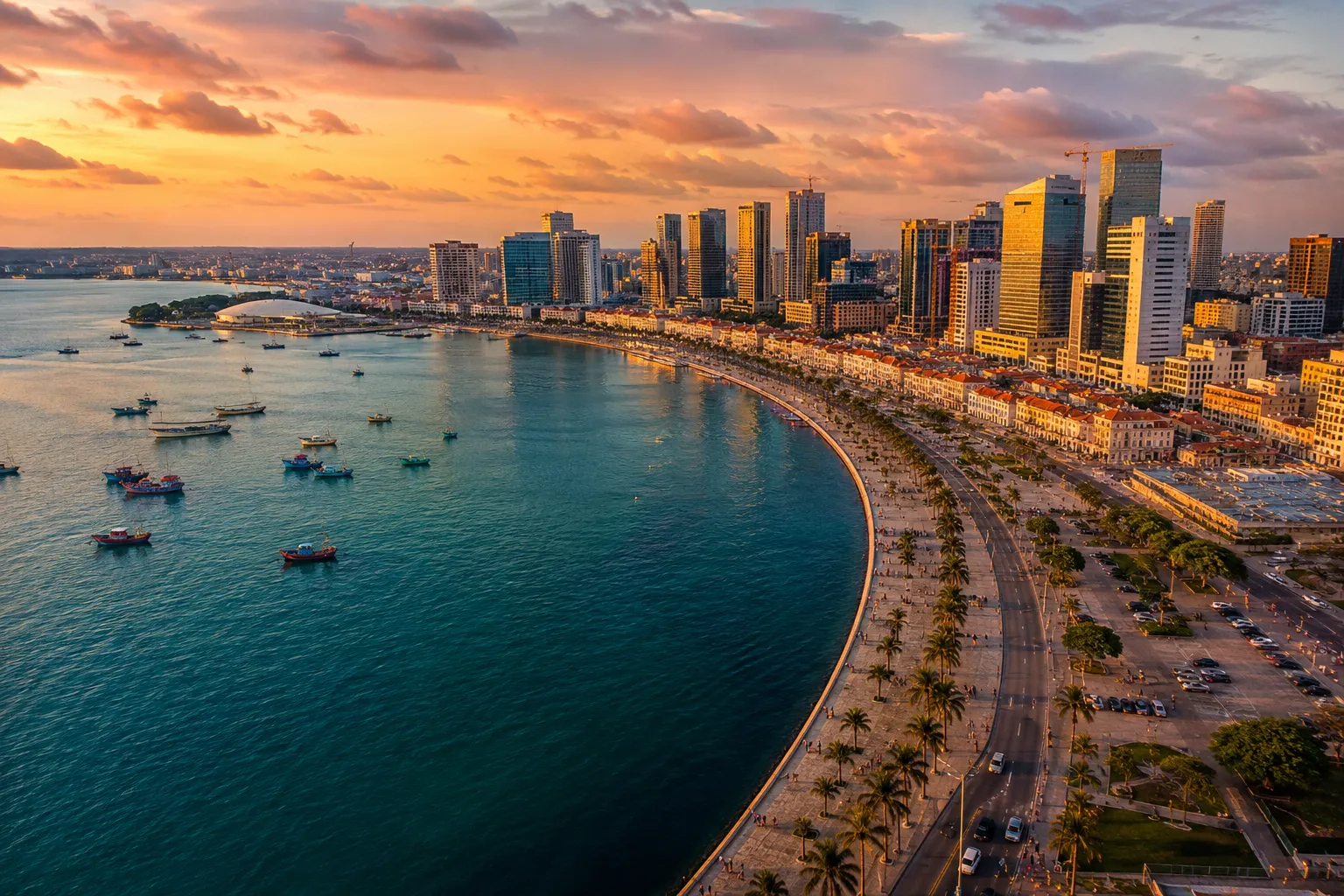 Aerial view of Luanda's bay and Marginal promenade at golden hour